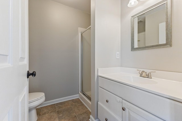 664 Huffine Manor Cir, Franklin, TN 37067 - bathroom with a shower stall, vanity, toilet, and baseboards