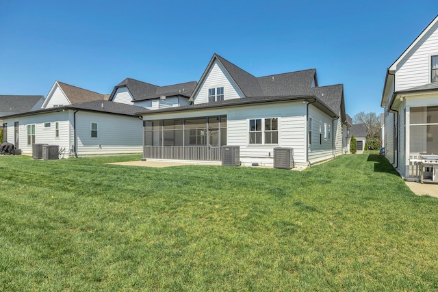 5735 Willoughby Way, Murfreesboro, TN 37129 - rear view of house featuring a sunroom, central air condition unit, and a lawn
