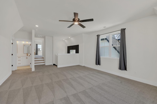 5735 Willoughby Way, Murfreesboro, TN 37129 - unfurnished living room with ceiling fan, light colored carpet, baseboards, recessed lighting, and stairs