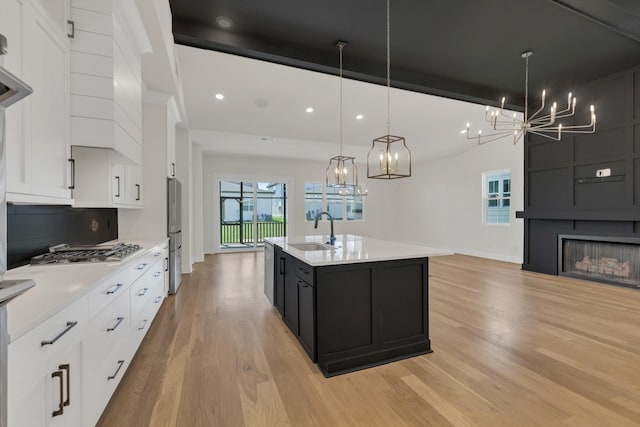 5735 Willoughby Way, Murfreesboro, TN 37129 - kitchen featuring a chandelier, a sink, stainless steel appliances, light countertops, and recessed lighting