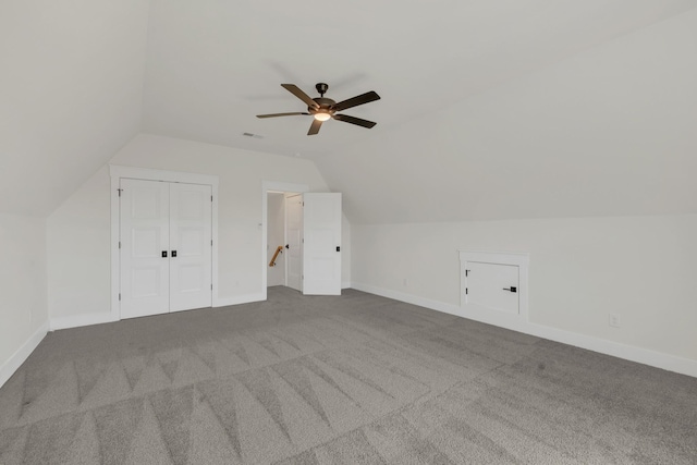 5735 Willoughby Way, Murfreesboro, TN 37129 - additional living space with vaulted ceiling, a ceiling fan, carpet flooring, and baseboards