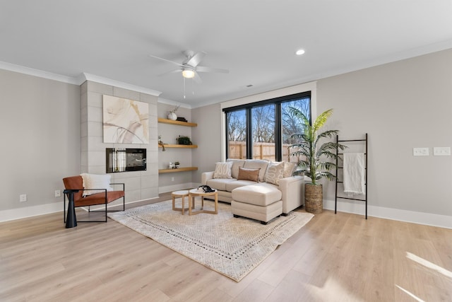 725 N Highland Ave, Murfreesboro, TN 37130 - living area with a ceiling fan, light wood-style flooring, baseboards, ornamental molding, and recessed lighting