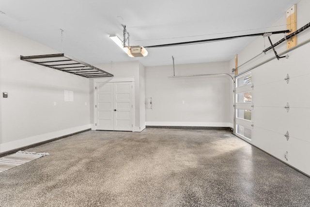 725 N Highland Ave, Murfreesboro, TN 37130 - garage featuring a garage door opener and baseboards