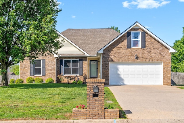 3659 Fieldstone Dr, Clarksville, TN 37040 - view of front of home with driveway, brick siding, a garage, and a shingled roof