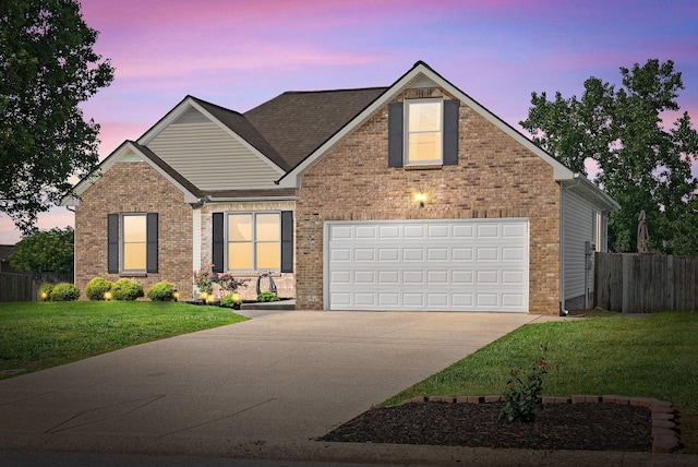 3659 Fieldstone Dr, Clarksville, TN 37040 - traditional-style home with concrete driveway, brick siding, a garage, and roof with shingles