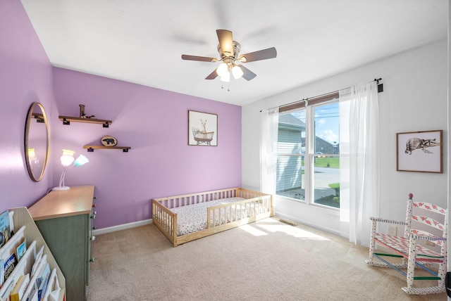 3659 Fieldstone Dr, Clarksville, TN 37040 - carpeted bedroom with baseboards and a ceiling fan