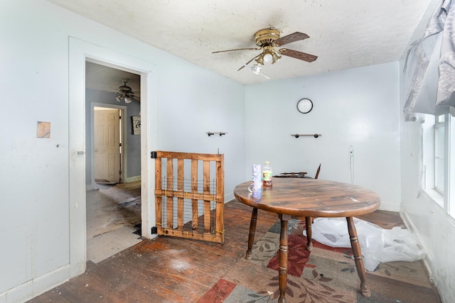 104 Lowe St, Ashland City, TN 37015 - dining area with ceiling fan, wood finished floors, and baseboards