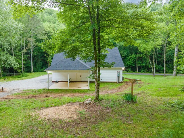 101 Henry Thompson Rd, Taft, TN 38488 - view of grassy yard featuring a forest view