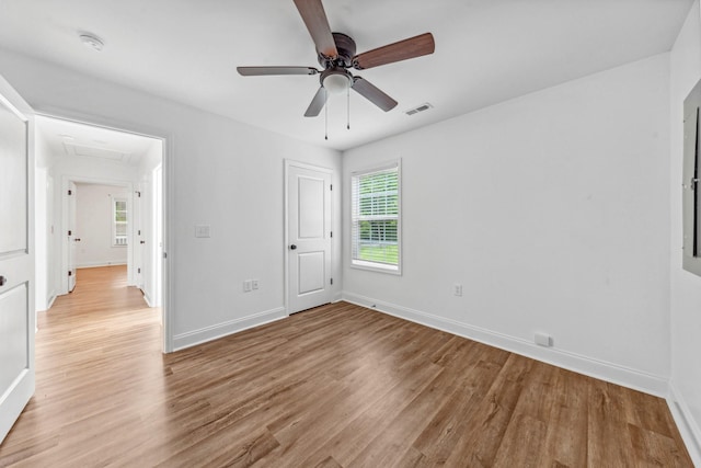 101 Henry Thompson Rd, Taft, TN 38488 - unfurnished bedroom with light wood-type flooring, baseboards, and ceiling fan