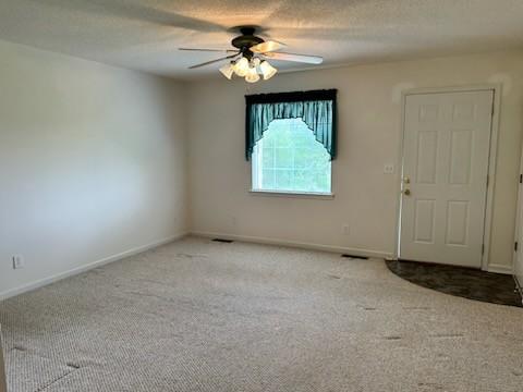 1368 Pleasant Hill Rd, Lynchburg, TN 37352 - unfurnished room with ceiling fan, carpet, and baseboards