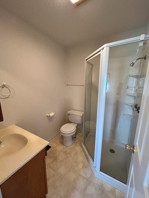 1368 Pleasant Hill Rd, Lynchburg, TN 37352 - bathroom featuring toilet, a stall shower, and vanity
