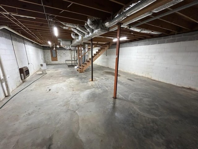 1368 Pleasant Hill Rd, Lynchburg, TN 37352 - unfinished below grade area featuring stairway, electric panel, concrete block wall, and heating unit