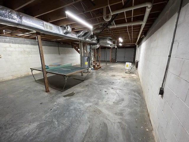 1368 Pleasant Hill Rd, Lynchburg, TN 37352 - unfinished basement featuring concrete block wall and water heater