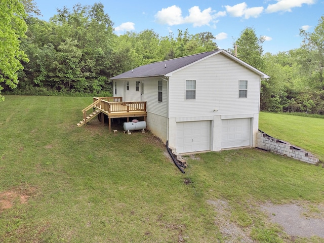 1368 Pleasant Hill Rd, Lynchburg, TN 37352 - rear view of property with a deck, a lawn, a garage, and driveway