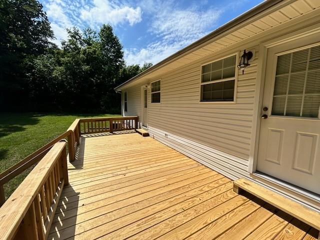 1368 Pleasant Hill Rd, Lynchburg, TN 37352 - wooden terrace featuring a lawn