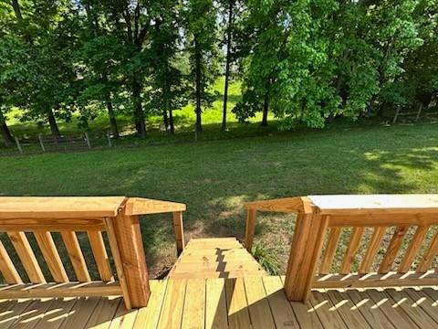 1368 Pleasant Hill Rd, Lynchburg, TN 37352 - view of grassy yard with a wooden deck