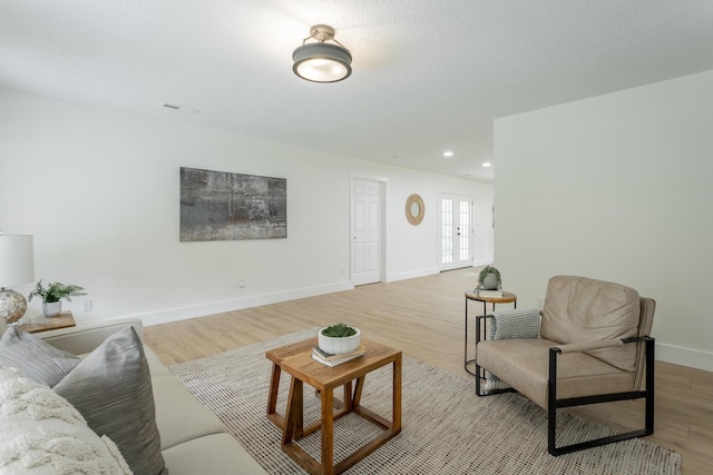 9039 Dallas Hollow Rd, Soddy Daisy, TN 37379 - living room with light wood-style floors, baseboards, and recessed lighting