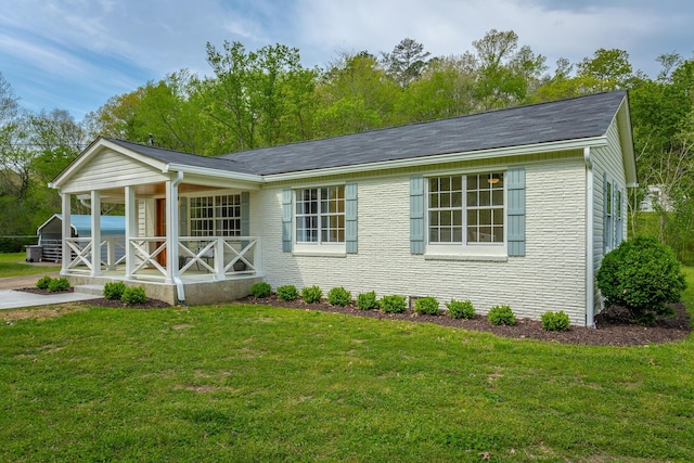 9039 Dallas Hollow Rd, Soddy Daisy, TN 37379 - view of front of house featuring a porch, a front lawn, and brick siding