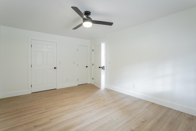 9039 Dallas Hollow Rd, Soddy Daisy, TN 37379 - unfurnished room with light wood finished floors, a ceiling fan, and baseboards