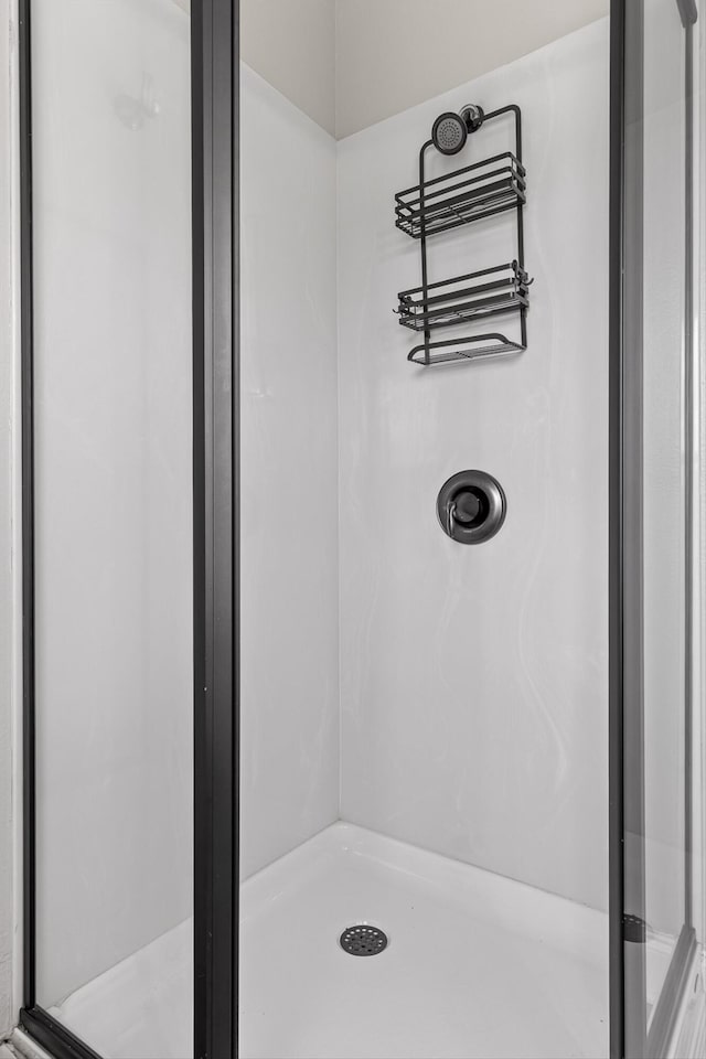 bathroom featuring a stall shower