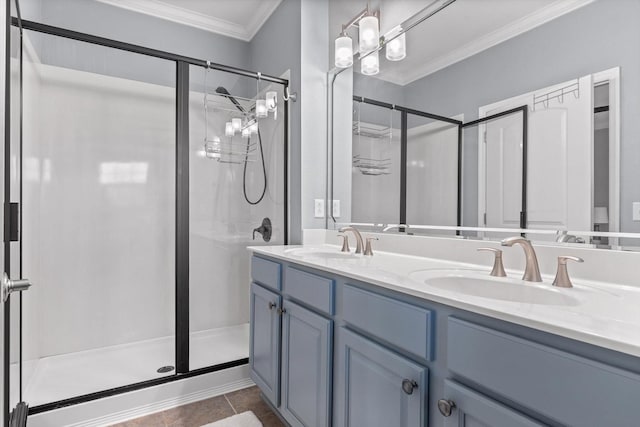 full bathroom with crown molding, a shower stall, double vanity, and tile patterned flooring