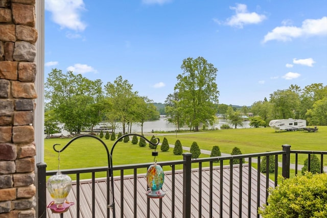 balcony featuring a water view