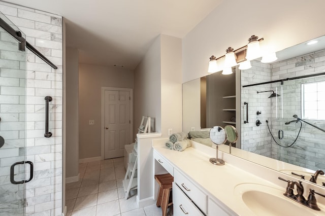 6737 Autumnwood Dr, Nashville, TN 37221 - bathroom featuring a stall shower, tile patterned floors, vanity, and baseboards