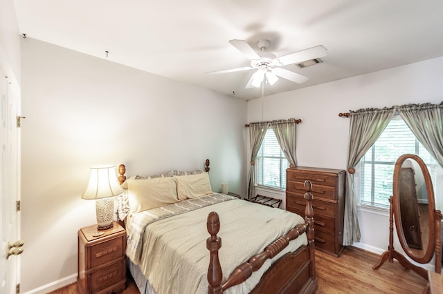 6737 Autumnwood Dr, Nashville, TN 37221 - bedroom featuring light wood-style flooring, baseboards, and a ceiling fan