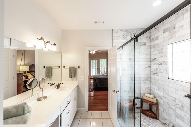 6737 Autumnwood Dr, Nashville, TN 37221 - bathroom featuring ensuite bath, double vanity, a shower stall, and french doors