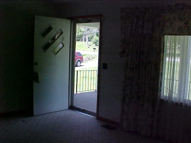 foyer with carpet