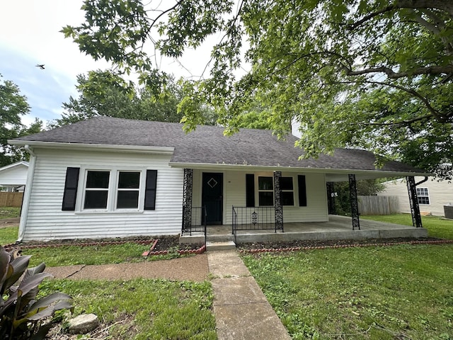 105 Murfreesboro St, Murfreesboro, TN 37127 - view of front of house with a porch, a shingled roof, and central AC