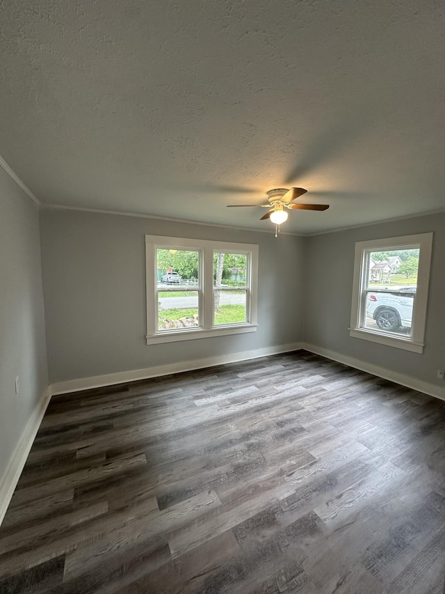 105 Murfreesboro St, Murfreesboro, TN 37127 - empty room with a textured ceiling, dark wood-style floors, a ceiling fan, baseboards, and crown molding