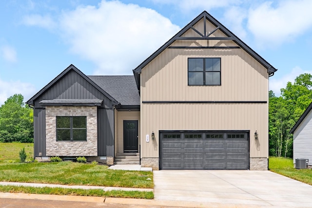 178 Dewberry Ct, Clarksville, TN 37042 - view of front of house with cooling unit, stone siding, concrete driveway, a shingled roof, and an attached garage