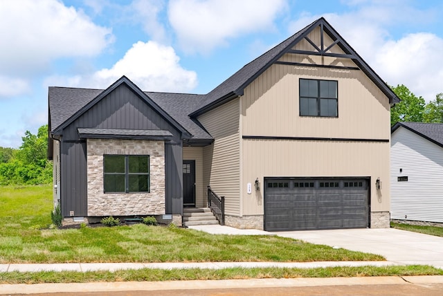 178 Dewberry Ct, Clarksville, TN 37042 - view of front of house with a shingled roof, an attached garage, stone siding, concrete driveway, and a front lawn