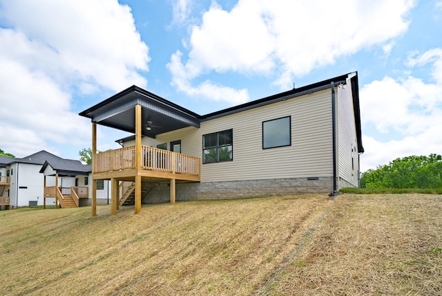 178 Dewberry Ct, Clarksville, TN 37042 - back of house featuring stairs, ceiling fan, a wooden deck, crawl space, and a lawn