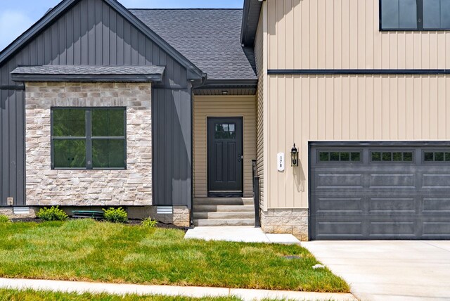 178 Dewberry Ct, Clarksville, TN 37042 - view of front facade featuring stone siding, a shingled roof, and a front lawn