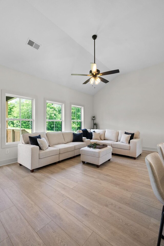 178 Dewberry Ct, Clarksville, TN 37042 - living room featuring vaulted ceiling, light wood finished floors, and a ceiling fan