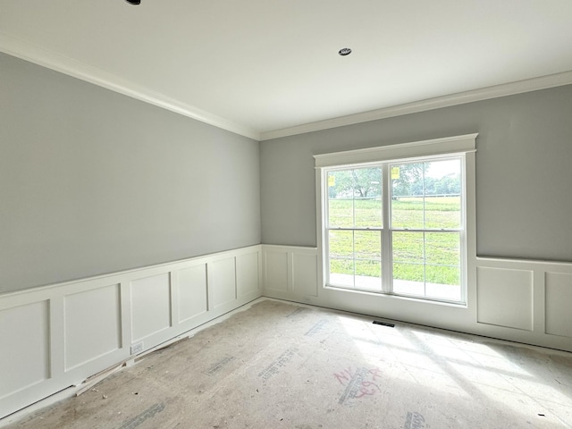 482 Greenfield Ln, Castalian Springs, TN 37031 - unfurnished room with a decorative wall, a wainscoted wall, and crown molding