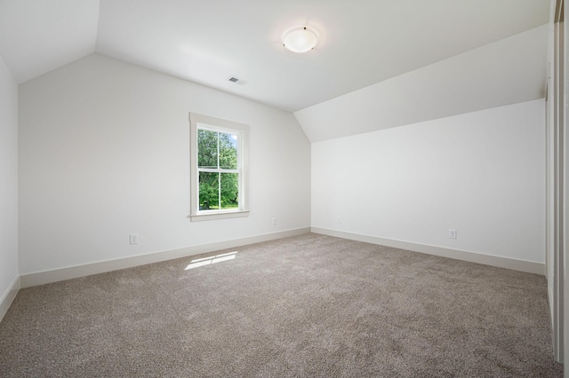 508 Gresham Ln, Murfreesboro, TN 37129 - bonus room featuring vaulted ceiling, carpet, and baseboards