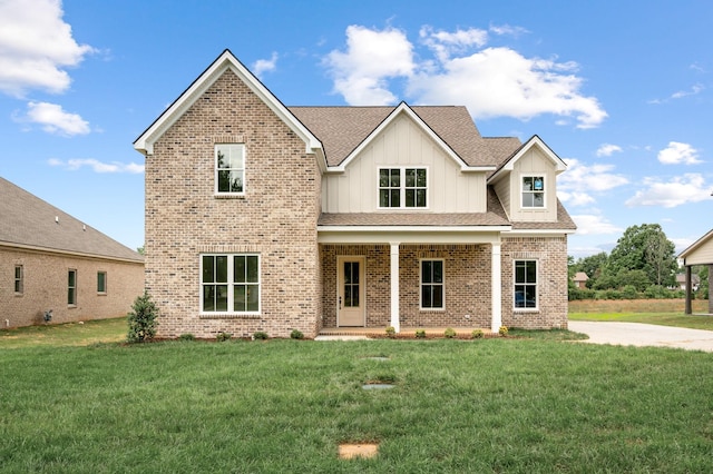 508 Gresham Ln, Murfreesboro, TN 37129 - view of front of house with brick siding, board and batten siding, a front lawn, and roof with shingles
