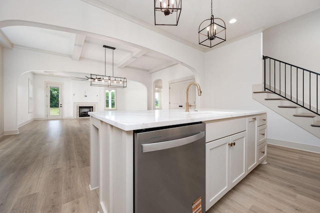 508 Gresham Ln, Murfreesboro, TN 37129 - kitchen with stainless steel dishwasher, arched walkways, open floor plan, light wood-type flooring, and beam ceiling