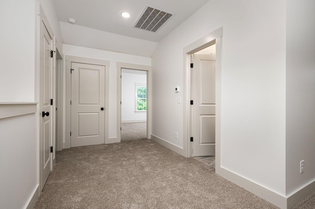 508 Gresham Ln, Murfreesboro, TN 37129 - hallway with light carpet, lofted ceiling, baseboards, and recessed lighting