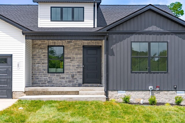 182 Dewberry Ct, Clarksville, TN 37042 - view of front facade with a shingled roof and board and batten siding