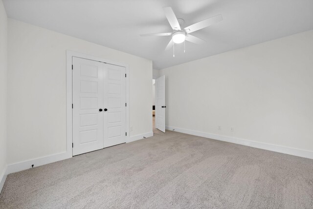 182 Dewberry Ct, Clarksville, TN 37042 - unfurnished bedroom featuring carpet flooring, a closet, baseboards, and a ceiling fan