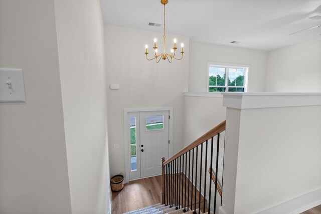186 Dewberry Ct, Clarksville, TN 37042 - entryway featuring a chandelier, wood finished floors, and ceiling fan