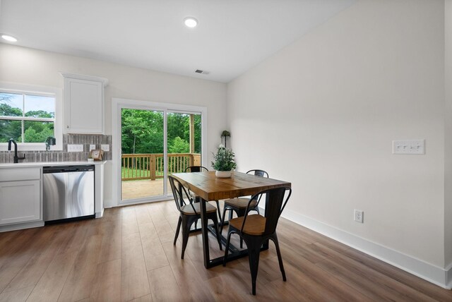 186 Dewberry Ct, Clarksville, TN 37042 - dining space featuring wood finished floors, recessed lighting, and baseboards