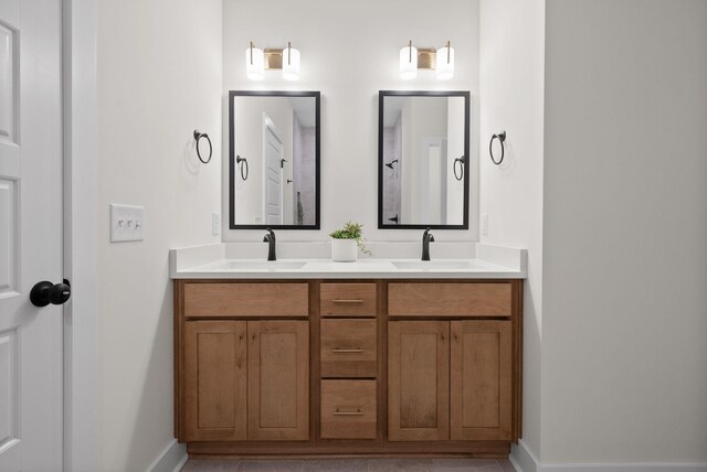 186 Dewberry Ct, Clarksville, TN 37042 - bathroom with double vanity and baseboards