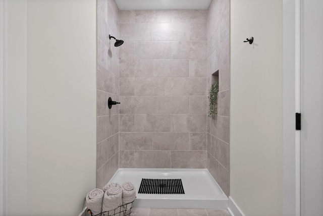 186 Dewberry Ct, Clarksville, TN 37042 - bathroom with tiled shower and tile patterned flooring