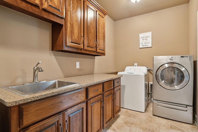 laundry room with cabinet space and washer and dryer