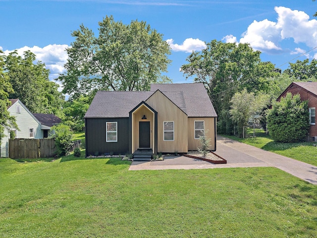 view of front of home featuring a shingled roof